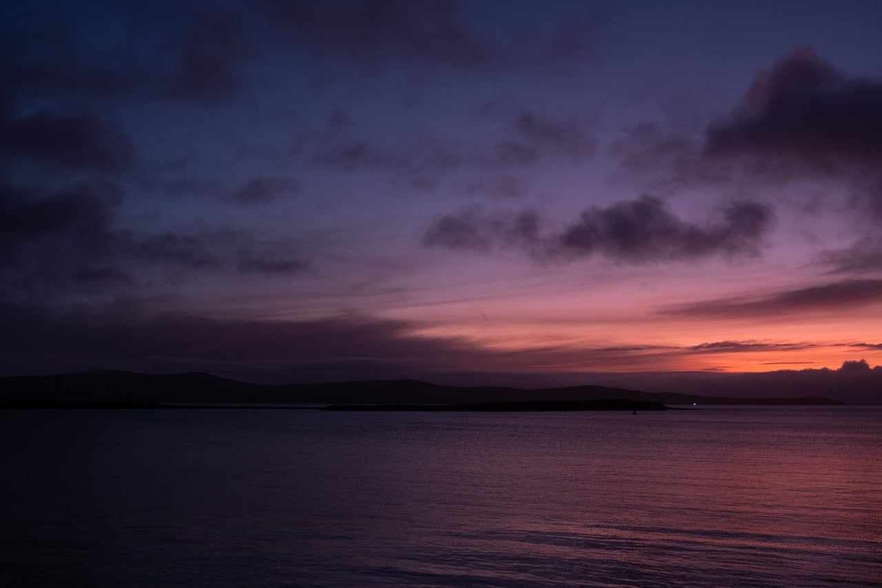 sunset over stromness in orkney 